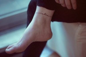 Ankle Lettering Tattoo
