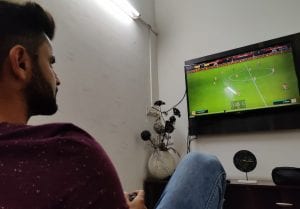 Read Scoops - Taruwar Kohli enjoying a game of FIFA