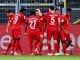 Bayern players celebrate Joshua Kimmich's goal