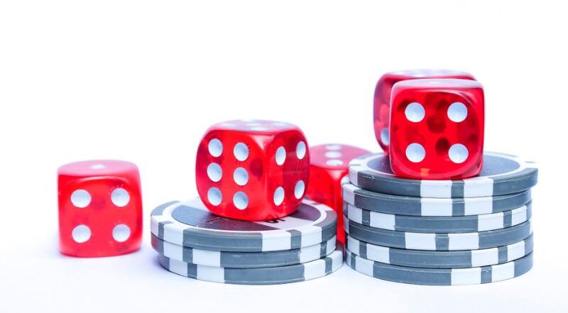 How Dice-Based Instant Games Structure Adjustable Win Probability